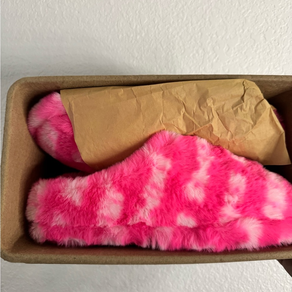 Pink SKIMS slippers for women